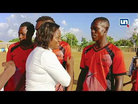 Women Rep. Kasalu Warms Soccer Game With Soft Hug