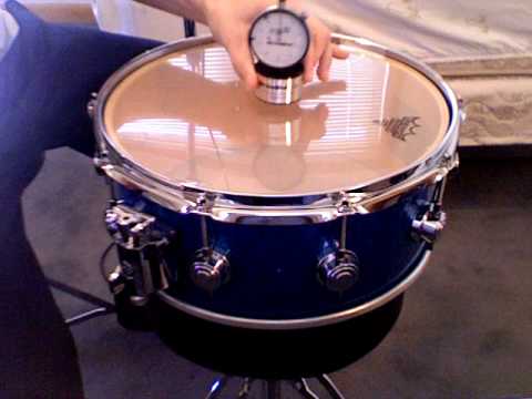 Tuning a snare drum with the drum dial