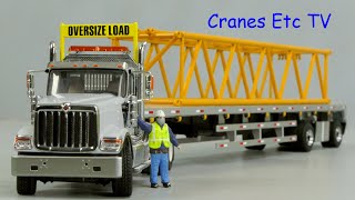 Diecast Masters International HX520 Tandem Tractor + 53' Flat Bed Trailer by Cranes Etc TV