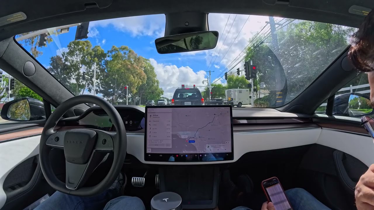 Raw 1x: Our Tesla drove us to CES with zero human input