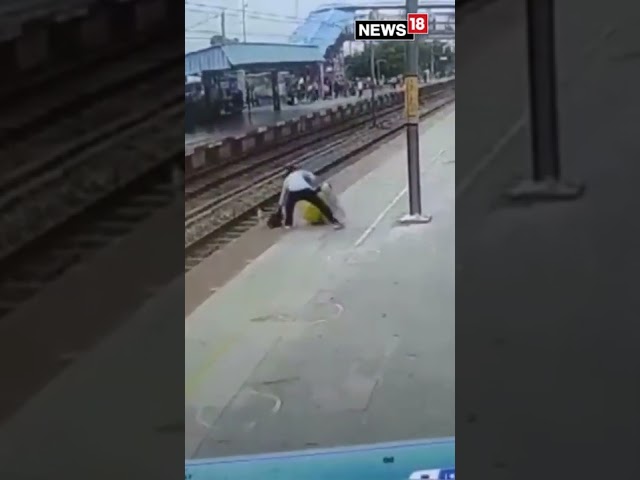 Woman Crossing Railway Track Saved By Inches In Uttar Pradesh | #viralvideo | #viralshorts class=