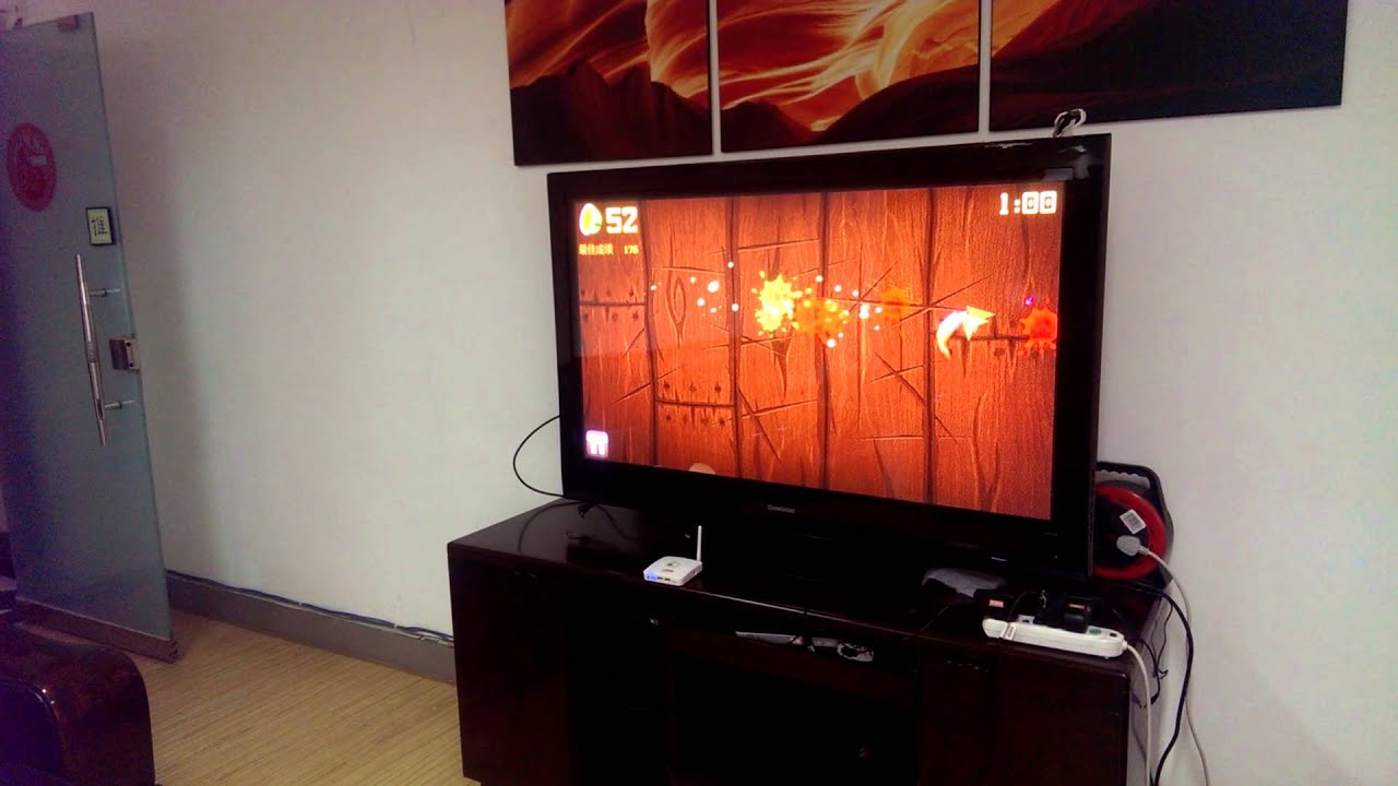 Playing Fruit Ninja on TV with AirGenie