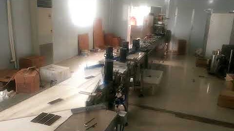 Flow wrapping machine for chocolate bar