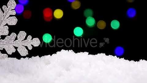 Brilliant White Snowflake On a Snow | Stock Footage - Envato elements