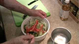 Cucumber Salad - My Way!
This is my variation on Staceys (dreamer72fem) recipe. Her video is here:
http://www.youtube.com/watch?v=PsRFmjWtHeA
I made this the day before, to serve with the smoked baby backs in the previous vid. Its an excellent, light and cool side dish, and great with any BBQ-ing. The zucchini turns out to be a great addition to it, retaining just a little more crunch than the cuke, and adding its own flavor. Ill be doing it this way again.
Intro music by Jason Shaw: http://www.audionautix.com/index.html
Title: Busybody
Thanks as always, Jason! Cucumber Salad - My Way!