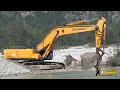 Hyundai 320nlc 7a excavator digging and loading trucks heavyequipment excavator digger truck