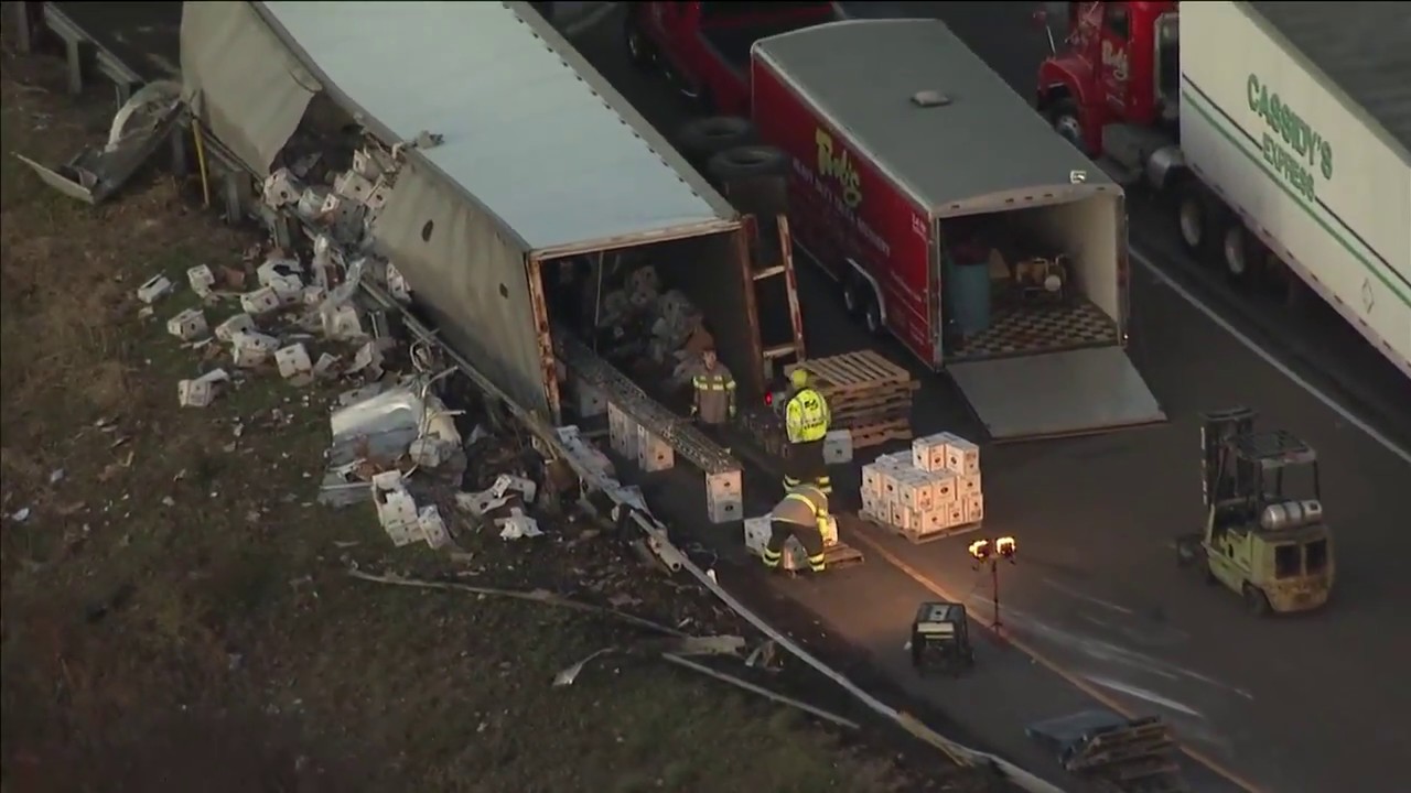 Tractor trailer carrying vodka overturns, closes I-95 ramp - YouTube