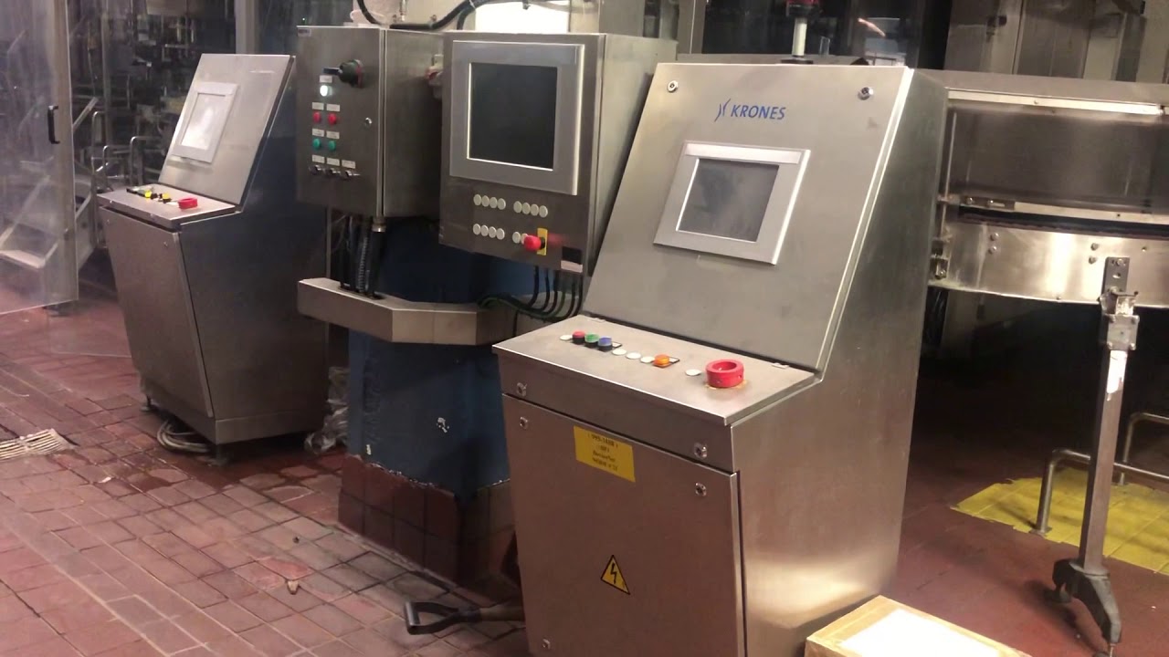 Tour Krones 100 with crowner and labeling system - YouTube