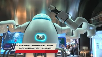 Robot barista Adam serves coffee  to CES customers in Las Vegas