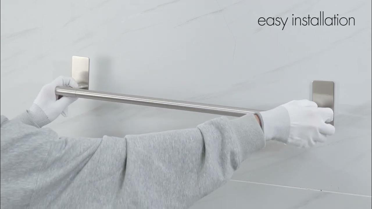 Don't wanna damage the wall? This selfadhesive towel rack will help