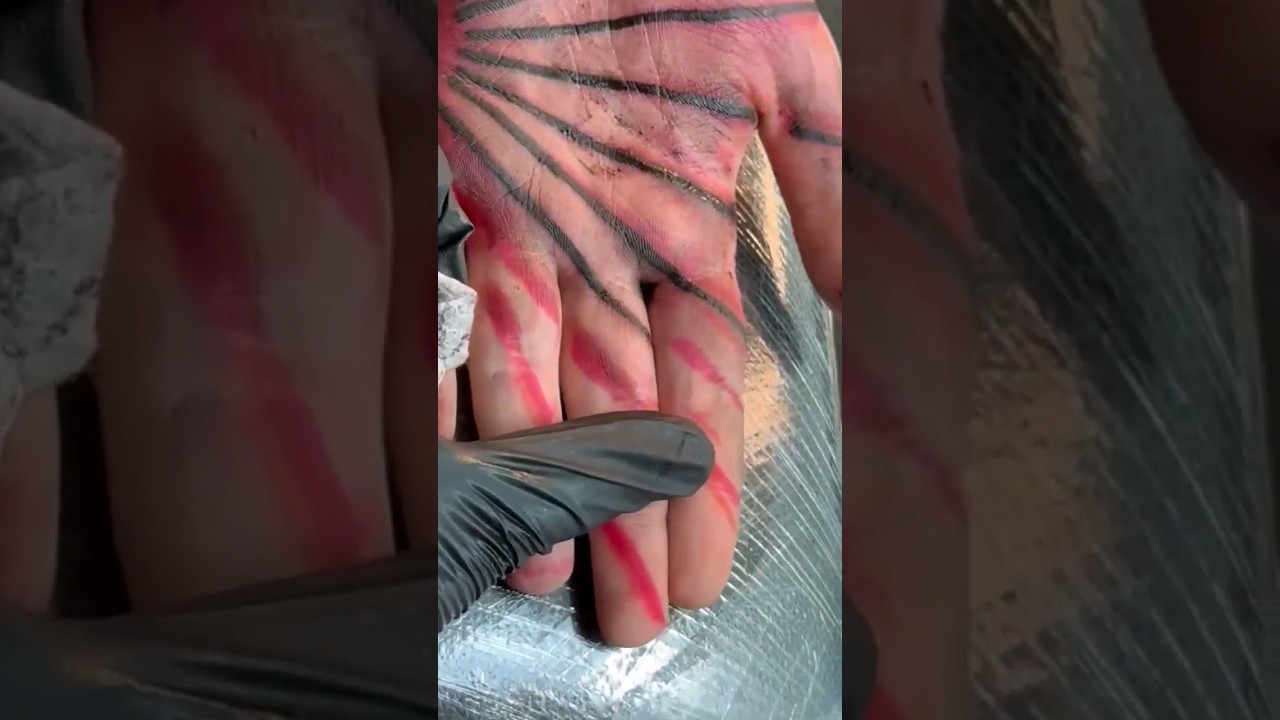 palm tattoo process. tattoo artist egbz. 