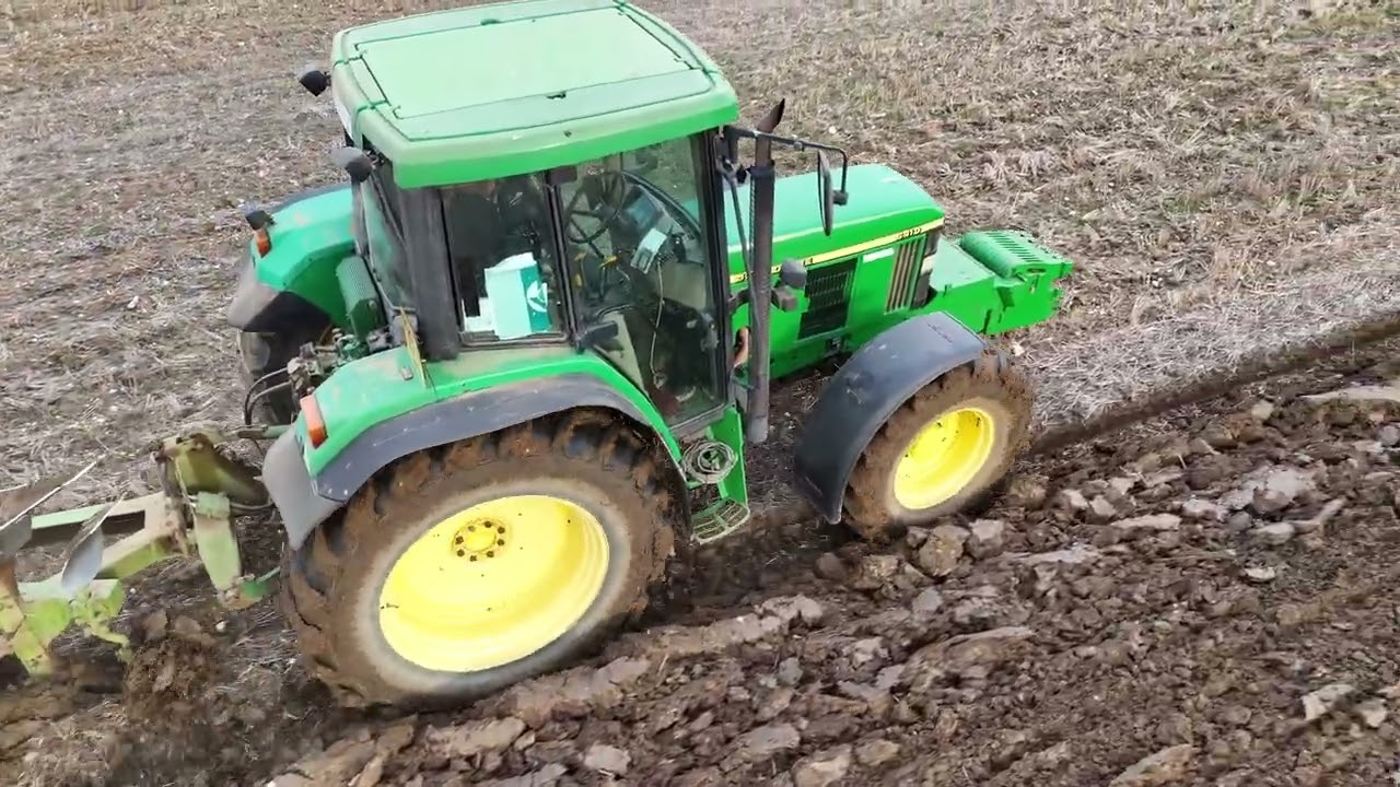 JOHN DEERE 6410 AND DOWDESWELL PLOUGH AND PRESS