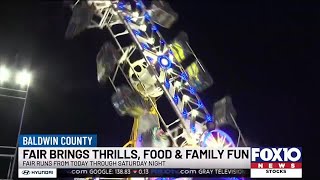 Whirls, twirls, and swirls! It’s the opening night of the Baldwin County Fair
