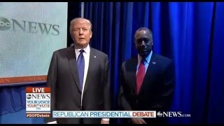 • Donald Trump waits for Ben Carson at New Hampshire debate intro • 2/6/16 •