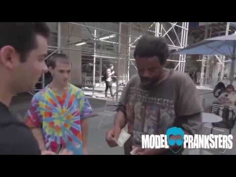 Kind Pranksters Ask Homeless Men To Arm Wrestle For Money