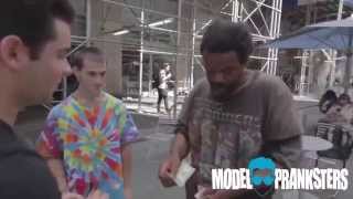 Kind Pranksters Ask Homeless Men to Arm Wrestle for Money