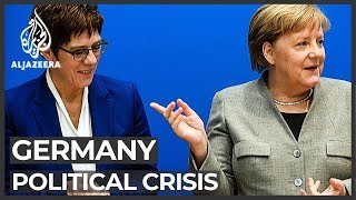 Merkel's favoured heir drops out of German chancellor race