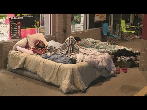Black Friday: people line up outside GameStop to get new PlayStation 5