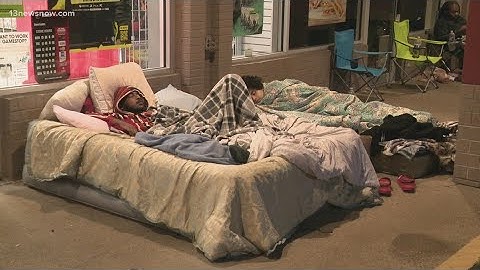 Black Friday: people line up outside GameStop to get new PlayStation 5