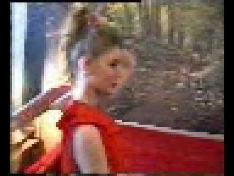 Long blond hair young woman shampoo at home by her 