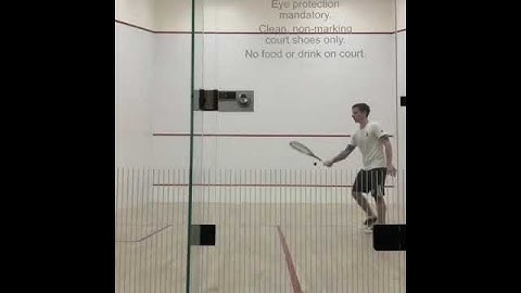 Squash Ball Through The Racquet & Catch in Slow Motion