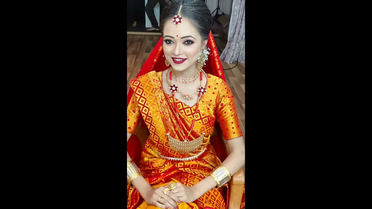 Glowing Nepali Bride in Red Dupatta Sari and Bridal Hairstyle - Photos Nepal