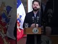 Boy dressed as superman steals show during chilean presidents address