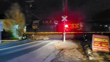SLOW CSX mixed freight train with EMD GP40-2 trailing in Woodbine