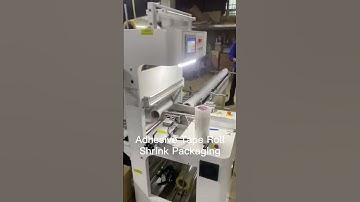 Small but efficient adhesive tape roll shrink wrap packaging machine