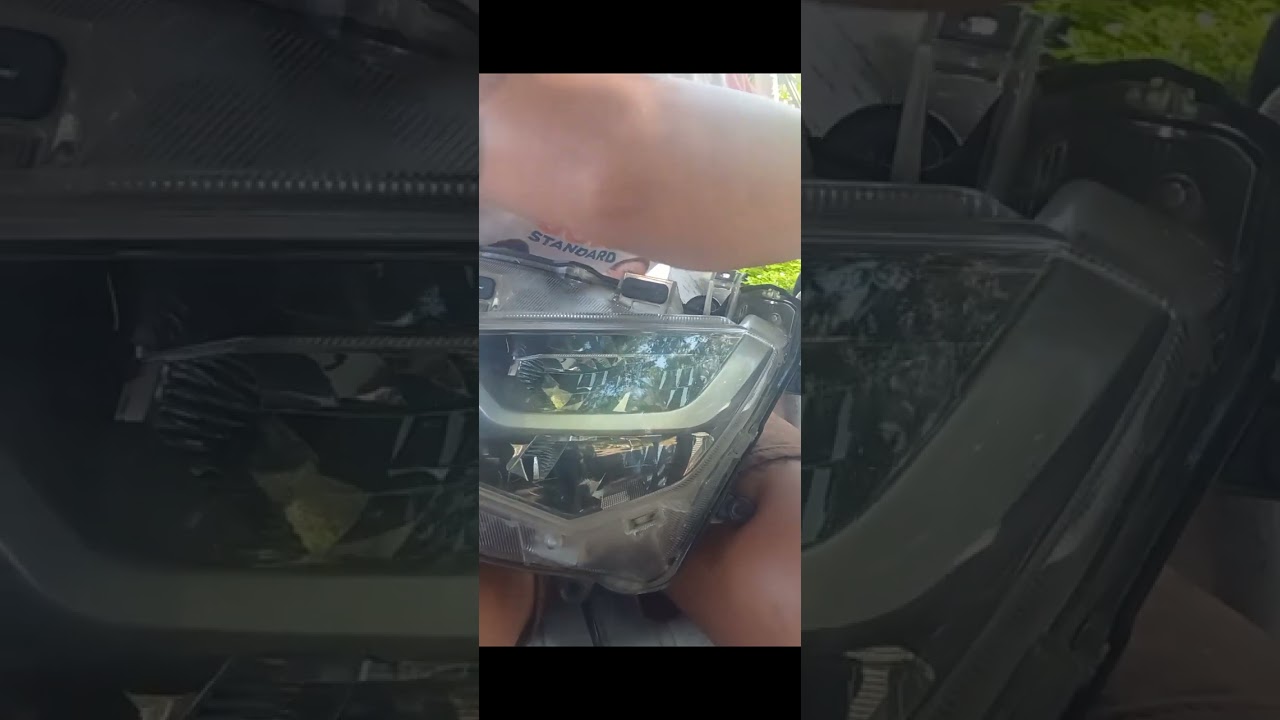Nmax headlight lense scratch removal using rubbing compound.. hand buff