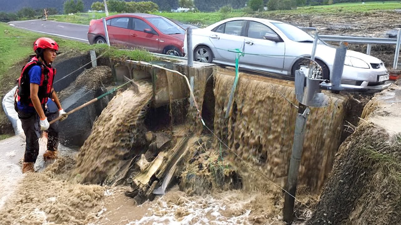 Releasing the Flow Clearing a Drain to Stop Street Flooding - YouTube