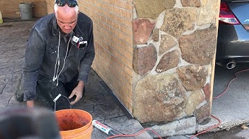 How to caulk concrete floor or driveway up against a wall.