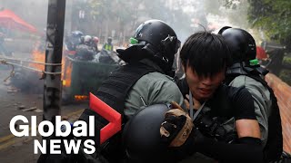 Hong kong police laid siege to a university on monday, arresting
anti-government protesters while firing rubber bullets and tear gas
pin back them as...