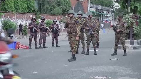 Bangladesh army enforces curfew as protests spiral | REUTERS