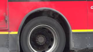 Smoking rear wheel on a Go-Ahead bus in London's Regent Street on 2nd March 2013