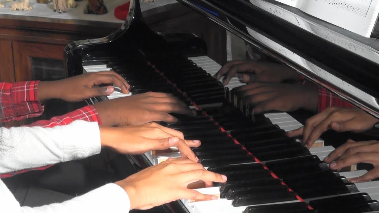 While Shepherds Watched  - arr. Robert Schultz,  Piano Duet by Melinda and Jefferson