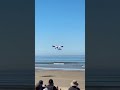 The Red Bull Carbon Cub FX-3 RC lifts off from a beach strip with effortless precision. 🏖️✈️