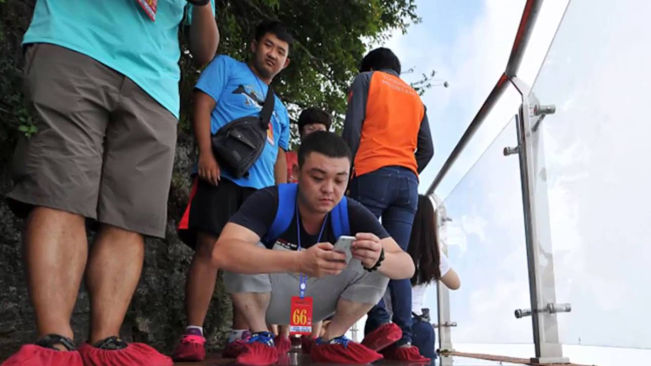 World’s Longest Glass Bridge, 590ft High, Opens In China – Tourists Too Scared To Walk It