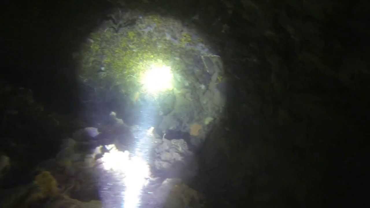 Exploring a cave by Boris Milosic