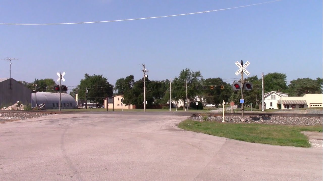 Main Street Railroad Crossing - CSX P051 with AMTK 140 in Chalmers, Indiana