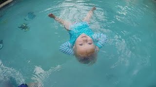 2-year-old twins swim on last day of swim lessons