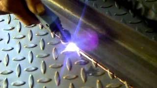 VID-20120928-00012.3GP PLASMA CUTTER FLYING THROUGH 10MM CHEQUER PLATE