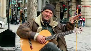 Laurent Fugere Classical Guitar Busking by Notre-Dame Basilica in Montreal