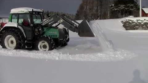 Valtra snowploughing