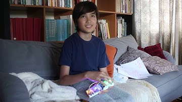 Anthony demonstrates adding binary numbers using adder chip