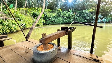 Water-powered corn pounder p6