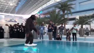 Monkey Walks on Water Using Futuristic Shoes at Tech Expo