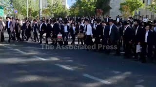 Ultra-Orthodox Jews protest in Jerusalem against enlistment in military service