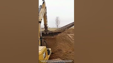 How They Build Trapezoidal Canals: Excavator & Measuring Pole in Action