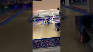 Man Slips Throwing Bowling Ball at Alley